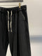 SYNGMAN CUCALA / WIDE EASY TAPERED TROUSERS / BLACK