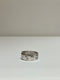 OLIVIER JEWELLERY / RIVETED LANDSCAPE RECESS RING WITH BLACK SAPPHIRE