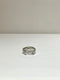 OLIVIER JEWELLERY / RIVETED LANDSCAPE RECESS RING WITH BLACK SAPPHIRE