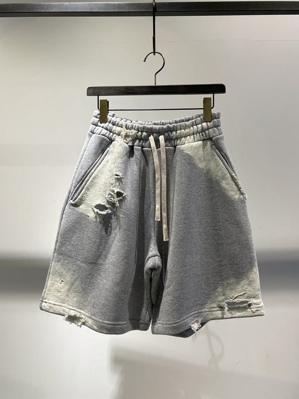 STAY HUMAN ON EARTH / SWEAT SHORTS / DAMAGED