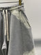 STAY HUMAN ON EARTH / SWEAT SHORTS / DAMAGED